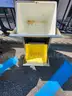 two drawer metal container with plastic bins in each drawer