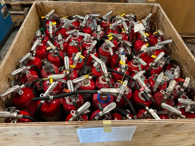 1 crate used and/or expired fire extinguishers