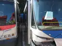 2 - 2009 New Flyer SCRAP buses. Model DE40LFA