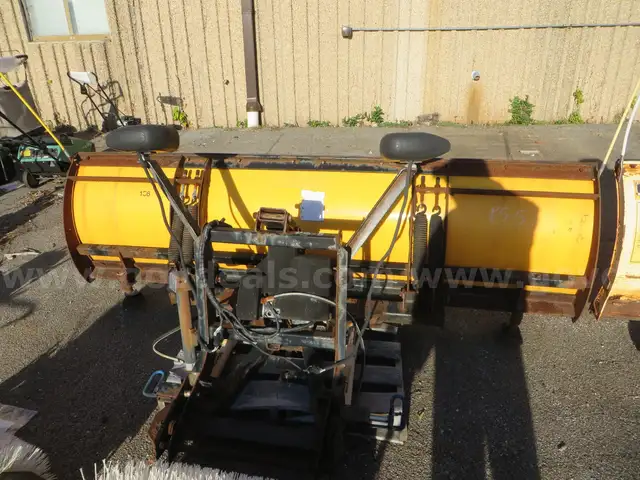 Meyer snow-plow with attachment and hydraulics.