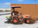 Kubota Tractor with Salt Spreader and attachment for a Plow