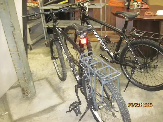 2-CANNONDALE BIKES WITH CAR CARRIERS