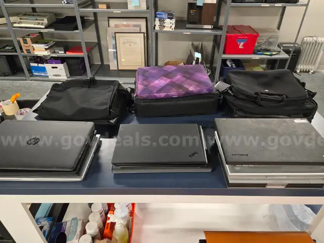 Lot of 12 Miscellaneous Laptops and 7 Computer Bags
