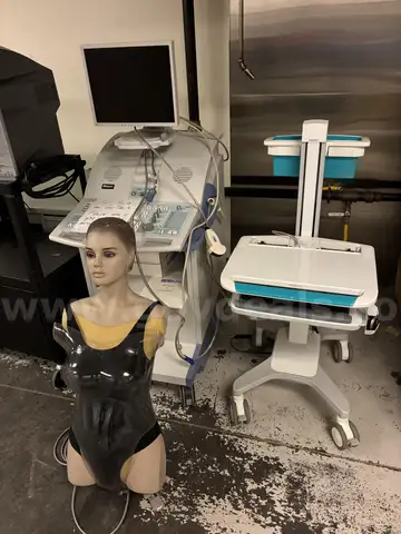 3 Medical carts and manikin