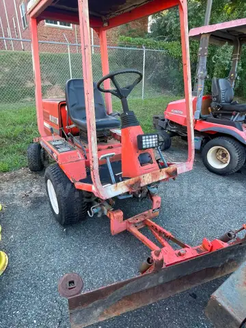 Kubota F2400 with plow