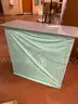 Lot of 8 collapsible standing height tables with velcro swappable fronts