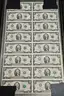 Uncut Roll of 2 Dollar Bills in Tube