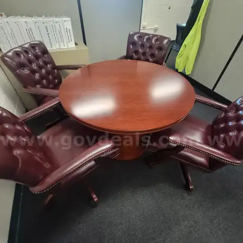 Round meeting table with 4 chairs