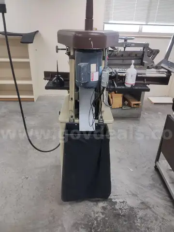 3 Hole puncher.