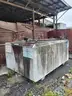 2000 gallon concrete encased above ground fuel enclosure.