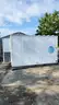 Mobile deployable Telecommunications office with 200A service and AC units included.