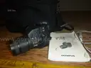 (1) E-20N Olympus Camera / (1) Epson LCD Projector Model No. H314A
