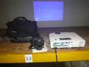 (1) E-20N Olympus Camera / (1) Epson LCD Projector Model No. H314A