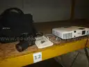 (1) E-20N Olympus Camera / (1) Epson LCD Projector Model No. H314A