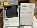 A Package of New iPhone Covers, Cases, Wall Charge Adapters, USB Cables