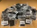 A Package of New iPhone Covers, Cases, Wall Charge Adapters, USB Cables