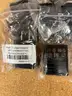 A Package of New iPhone Covers, Cases, Wall Charge Adapters, USB Cables