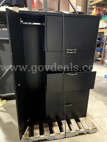 Metal storage cabinet with 3 different types of storage spaces