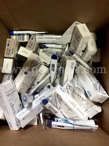 Large lot of digital thermometers and thermometer sheaths