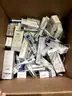 Large lot of digital thermometers and thermometer sheaths