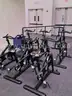 Forty four pieces of used exercise equipment fair condition or worse