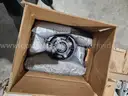 Pallet of new old stock fire truck parts power steering reservoirs, fan clutch kits, Cummins water pump, etc.
