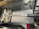 Lot of Die Cut Machines, Assorted Dies, Storage Racks, &#x26; Cutting Table