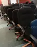 6 Black Rolling Desk Chairs with Wooden Trim - Used