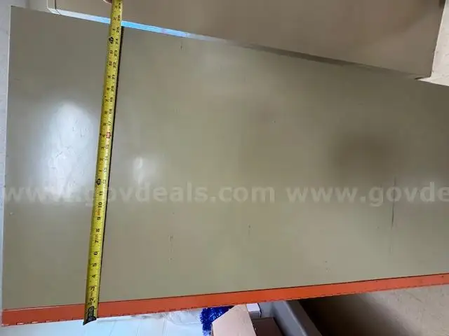Rolling metal cabinet. About 65&#x22; tall, 26&#x22; deep, and 37&#x22; wide.