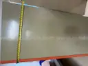 Rolling metal cabinet. About 65&#x22; tall, 26&#x22; deep, and 37&#x22; wide.