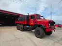 1990 BMY 5 Ton. 1000 gallon tank and pump.