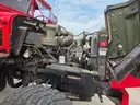 1990 BMY 5 Ton. 1000 gallon tank and pump.