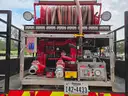 1990 BMY 5 Ton. 1000 gallon tank and pump.