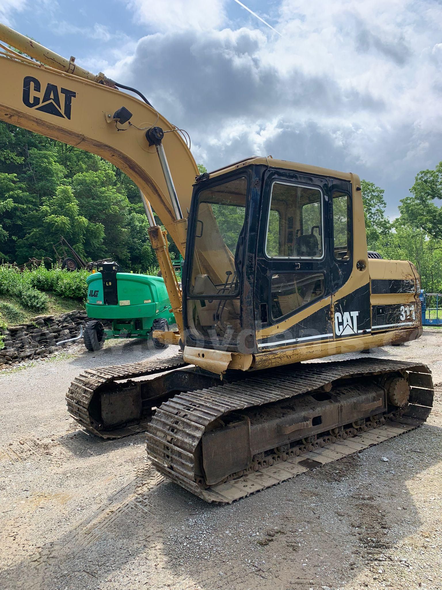 Photo of a 1994 Caterpillar 311
