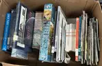 Two boxes of books and maps from Social Studies Classroom