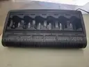 6 Motorola XTS 5000 Portable Radios and Six Bank Charger Station