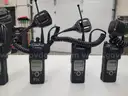 6 Motorola XTS 5000 Portable Radios and Six Bank Charger Station
