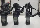 6 Motorola XTS 5000 Portable Radios and Six Bank Charger Station