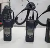 6 Motorola XTS 5000 Portable Radios and Six Bank Charger Station