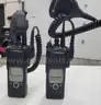 6 Motorola XTS 5000 Portable Radios and Six Bank Charger Station