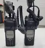 6 Motorola XTS 5000 Portable Radios and Six Bank Charger Station
