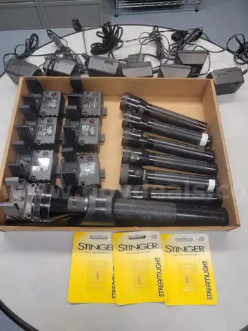 6 streamlight stinger flashlights, 1 streamlight SL-20X flashlight, 7 chargers