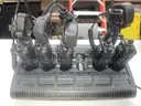 5 Motorola XTL 5000 Mobile Radios and 6 bank charging station