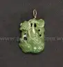 6 Assorted Carved Stone Pendants