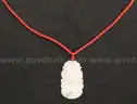 6 Assorted Carved Stone Pendants