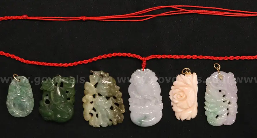 6 Assorted Carved Stone Pendants