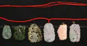 6 Assorted Carved Stone Pendants