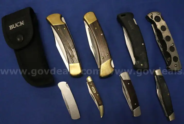 8 Assorted Buck Pocket Knives