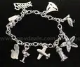 James Avery Sterling Silver Medium Twist Charm Bracelet and 8 Charms, 31.8 Grams