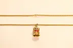10k Yellow Gold Curb Link Necklace and Enameled Crown Pendant, 16.9 Grams